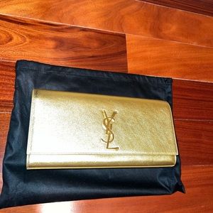 YSL KATE CLUTCH in gold leather with gold hardware.